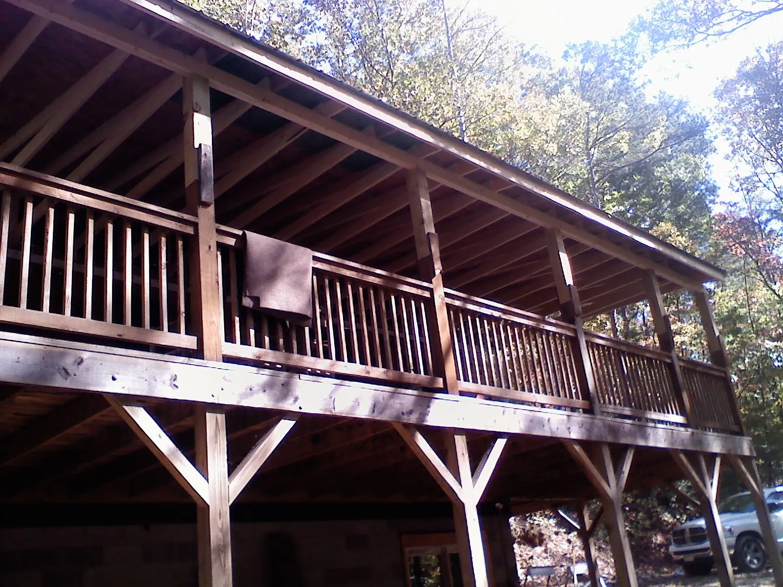Timber framing under a new elevated porch and deck — Roof Leak Repair in Kingwood by Roofing Brothers
